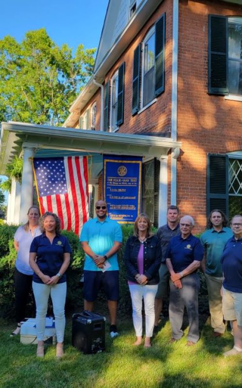 Julia and the Charles Town Rotary Club at a Rotary event